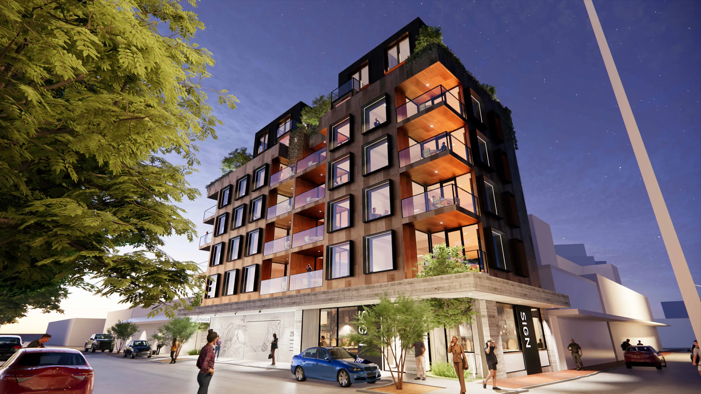 Render of the building at dusk on its Subiaco corner, with timber-look cladding, dark framed windows and lit balconies